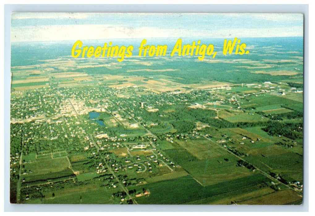1980 Aerial View of Antigo Wisconsin Greetings from Antigo WI Postcard
