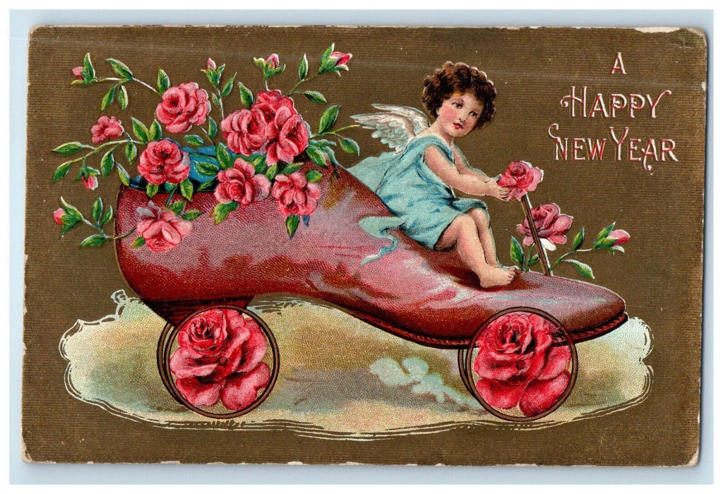 c1910's A Happy New Year Giant Shoes Angel Cherub Riding Embossed Postcard