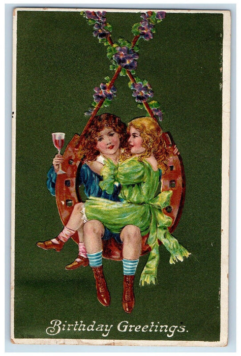 c1910's Birthday Greetings Hanging Horsehoe Boy And Girl Swing Embossed Postcard