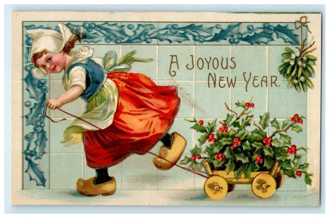 1910 New Year Girl In Dress Pulling Cart With Holly Berries Embossed Postcard