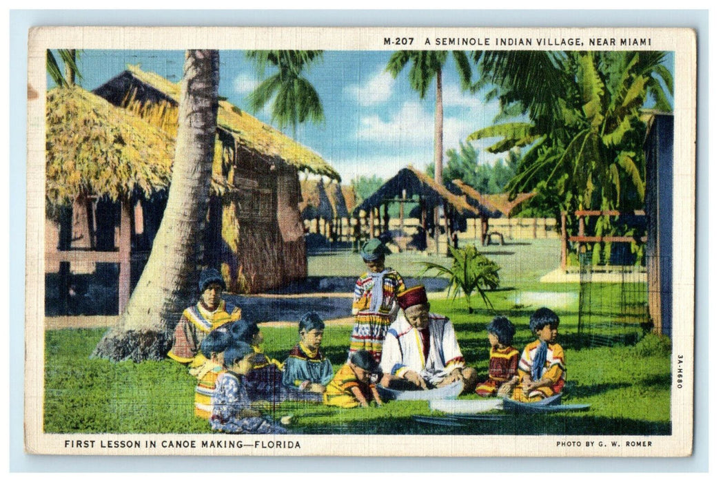 1934 A Seminole Indian Village, Canoe Making Lesson Florida FL Cancel Postcard