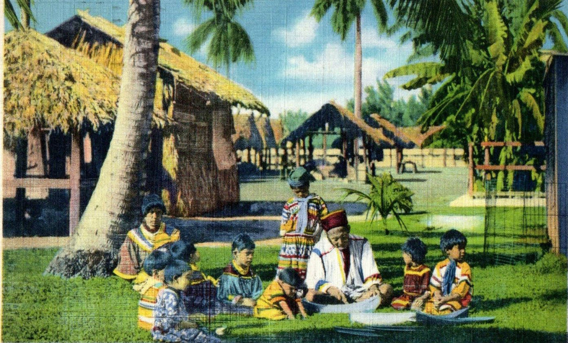 1934 A Seminole Indian Village, Canoe Making Lesson Florida FL Cancel Postcard