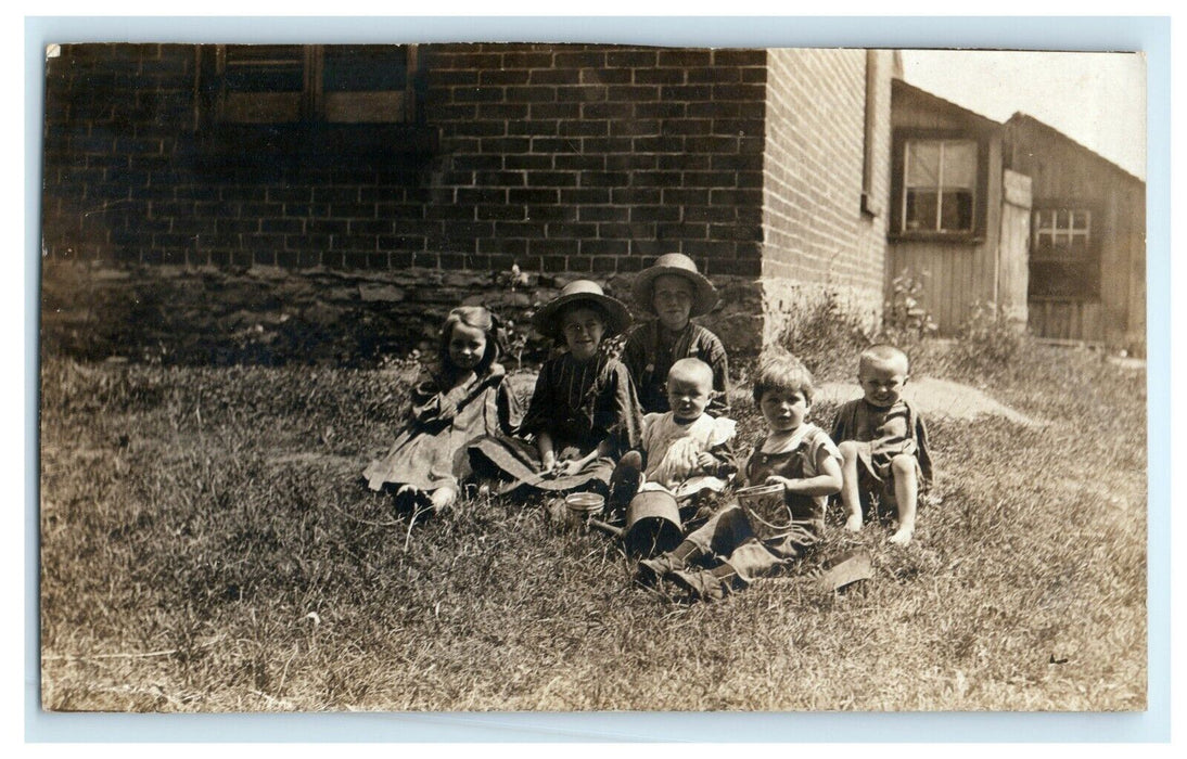1909 Children Family Outside House Belleville Ontario Canada RPPC Photo Postcard