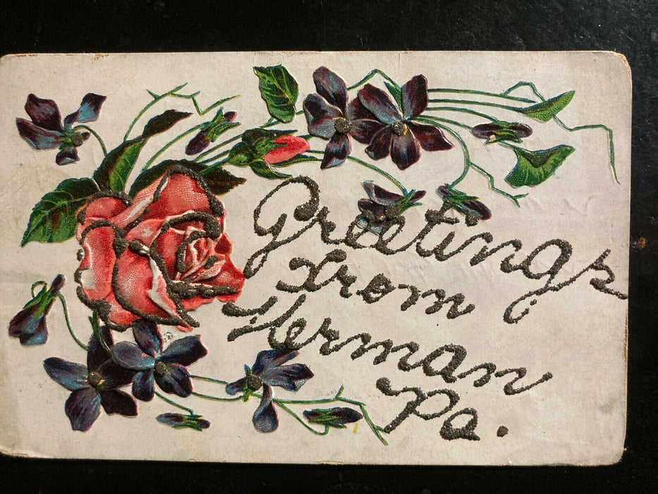 c1910 Greetings From Herman Pennsylvania PA Glitter Embossed Flowers Postcard