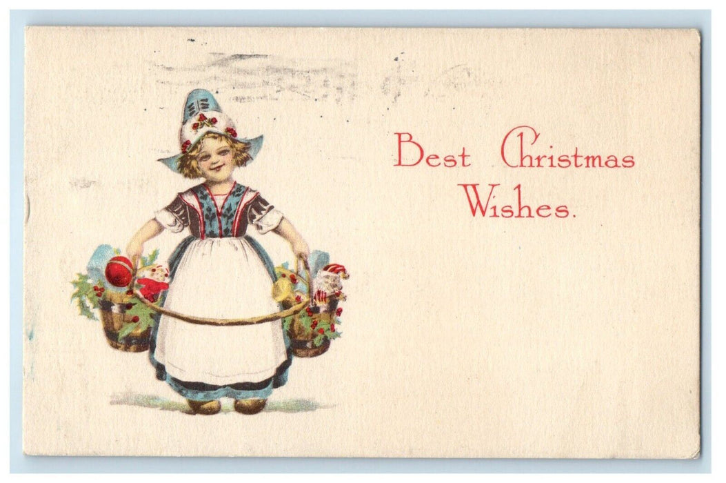 1915 Christmas Wishes Dutch Girl Dress Apron With Toys Holly Berries Postcard