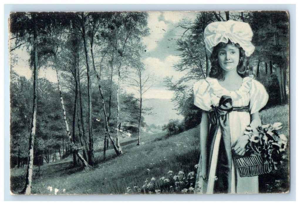 1909 Easter Girl At Field Basket Of Flowers Seattle Massachusetts MA Postcard