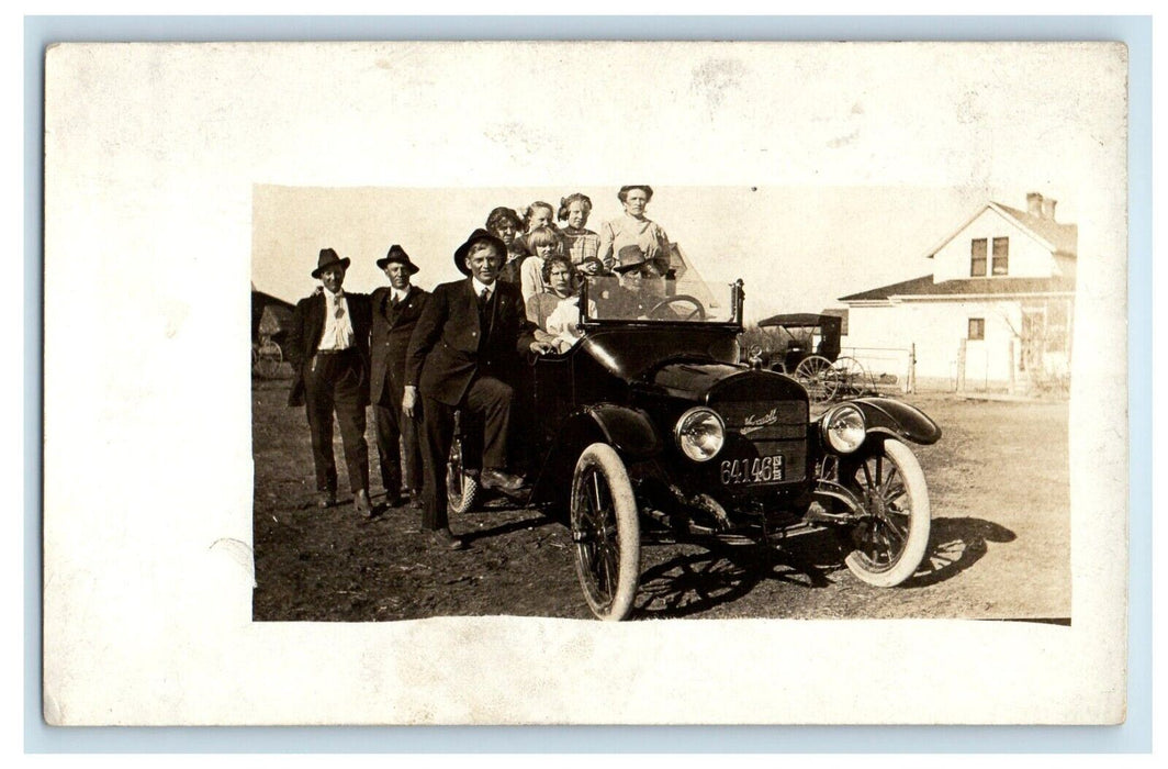 c1910's Family Riding Maxwell Car Nebraska NE RPPC Photo Antique Postcard