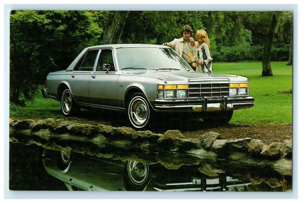 c1970s Couple with Chrysler LeBaron Medallion Four Door Postcard