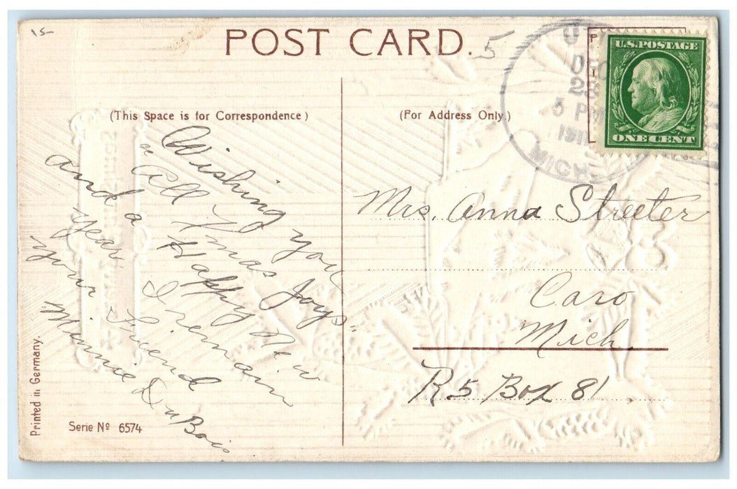 c1910's Christmas Pine Trees Cone Bells House Winter Snow Embossed Postcard
