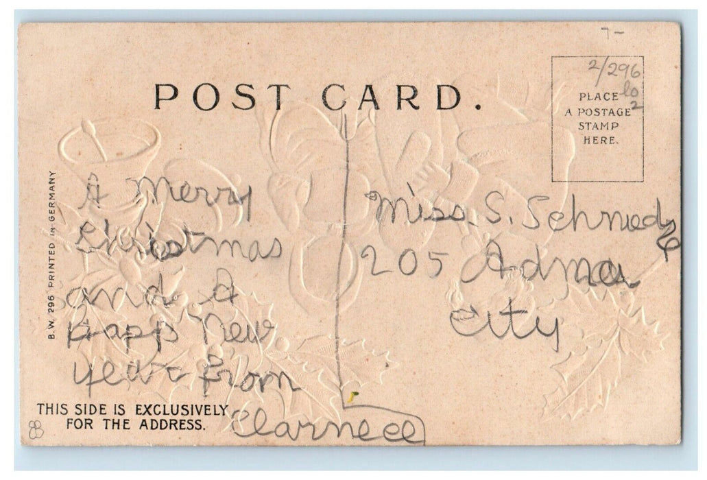 c1910 Children Building Snow Man Bells Holly Merry Christmas Embossed Postcard