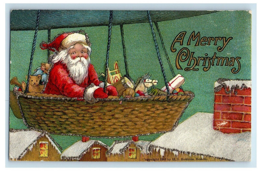 c1910 Merry Christmas Santa in Airship Dirigible Toys Chimney Glitter Postcard