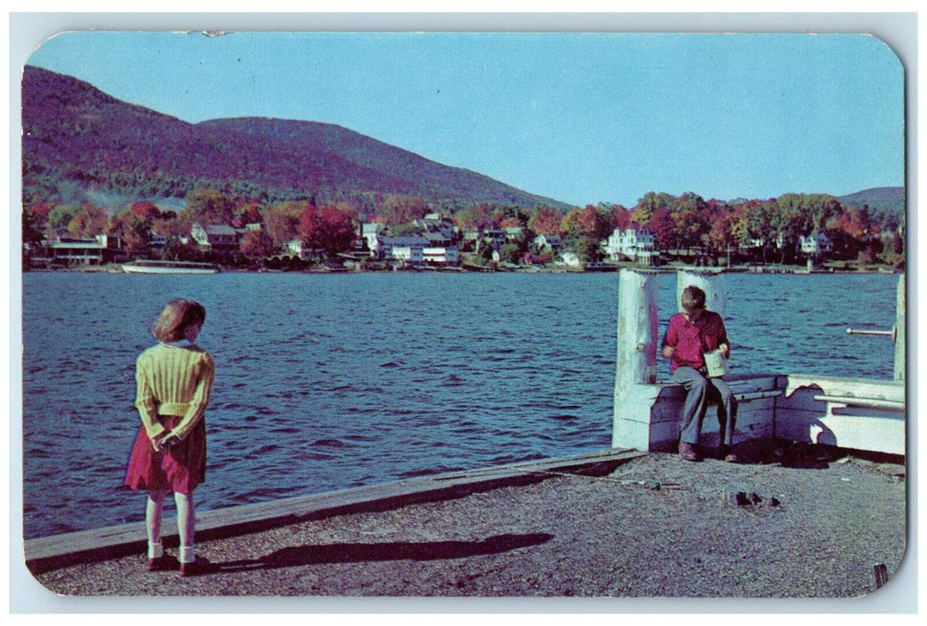 c1950's Two Youngsters, Lake George Village from the Steamboat Dock NY Postcard