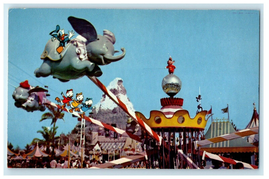 Disneyland Flying Dumbo Ride Donald Duck In Fantasyland Anaheim CA Postcard