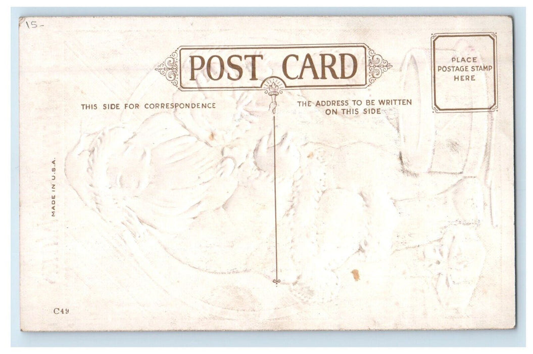c1910's Christmas Greetings Santa Claus Preparing Gift Toys Embossed Postcard