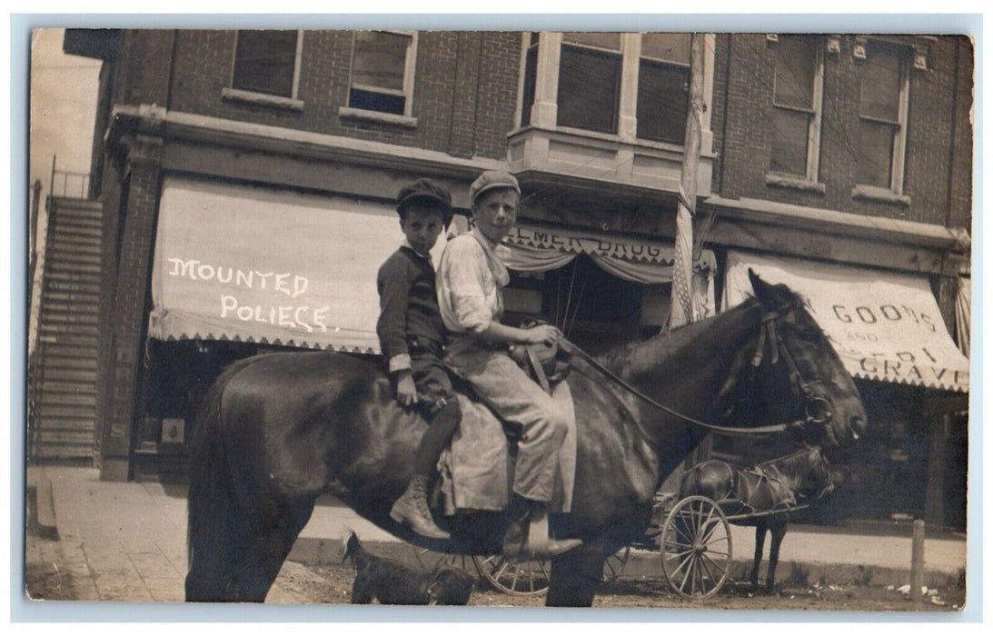 c1910's Killmer Drug Store Two Boys Riding Horse Dog Police RPPC Photo Postcard