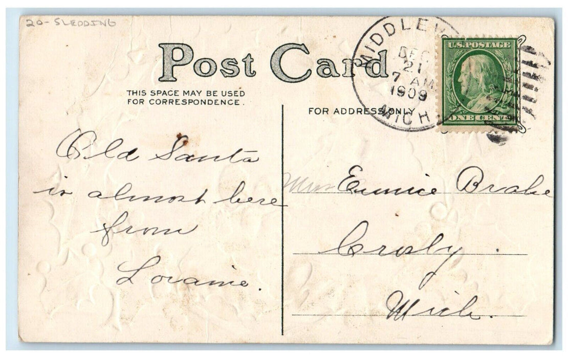 1909 Merry Christmas Boy And Girl Sledding Winter Snow Holly Embossed Postcard