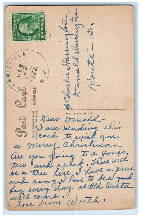 1922 Christmas Santa Claus Head Poinsettia Flowers And Stockings Posted Postcard