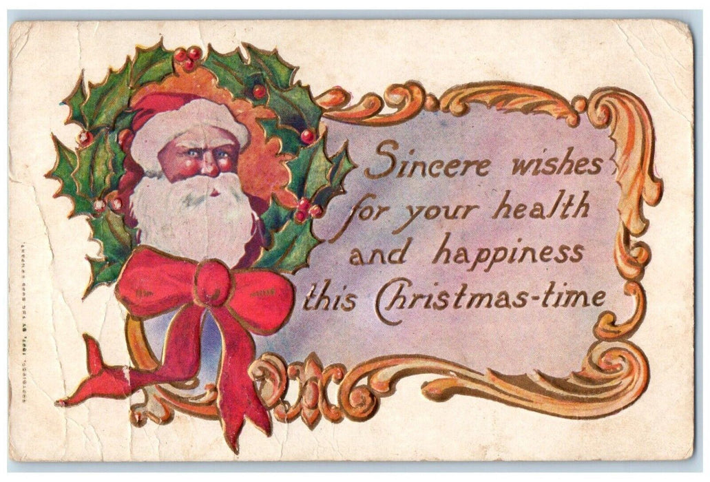 1907 Christmas Santa Claus Head Holly Red Ribbon Embossed Antique Postcard