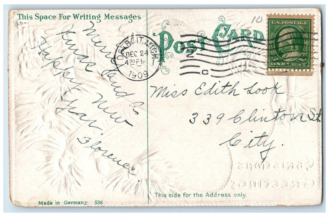 1909 Christmas Greetings Pine Cone Reindeer Candle Winter Snow Embossed Postcard
