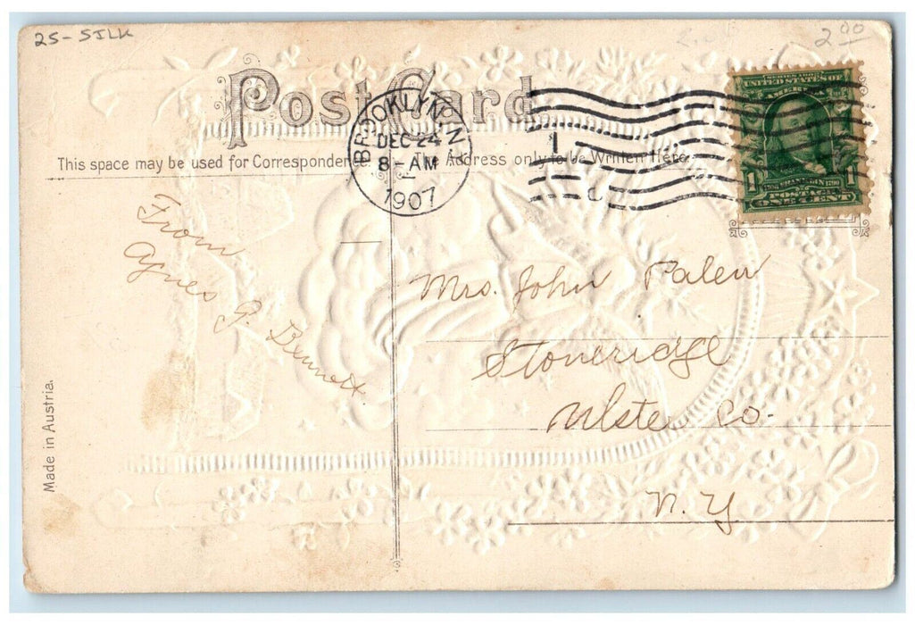 1907 Christmas Greetings Floating Angel Pinne Tree Silk Embossed Posted Postcard