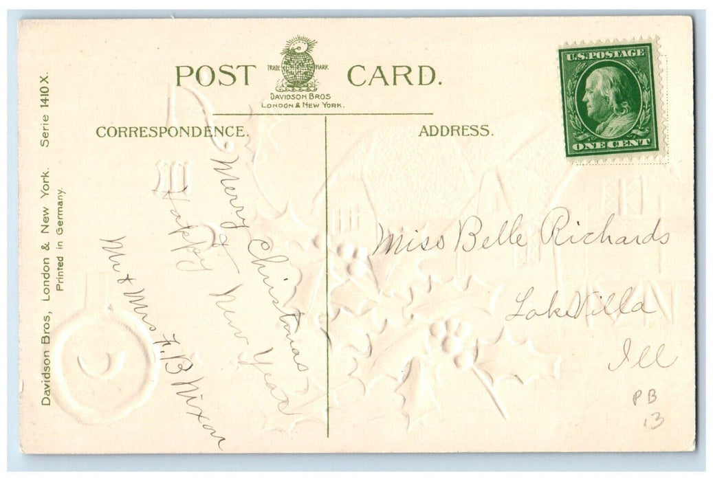 c1910's Christmas Holly Berries House Chimney Winter Snow Embossed Postcard