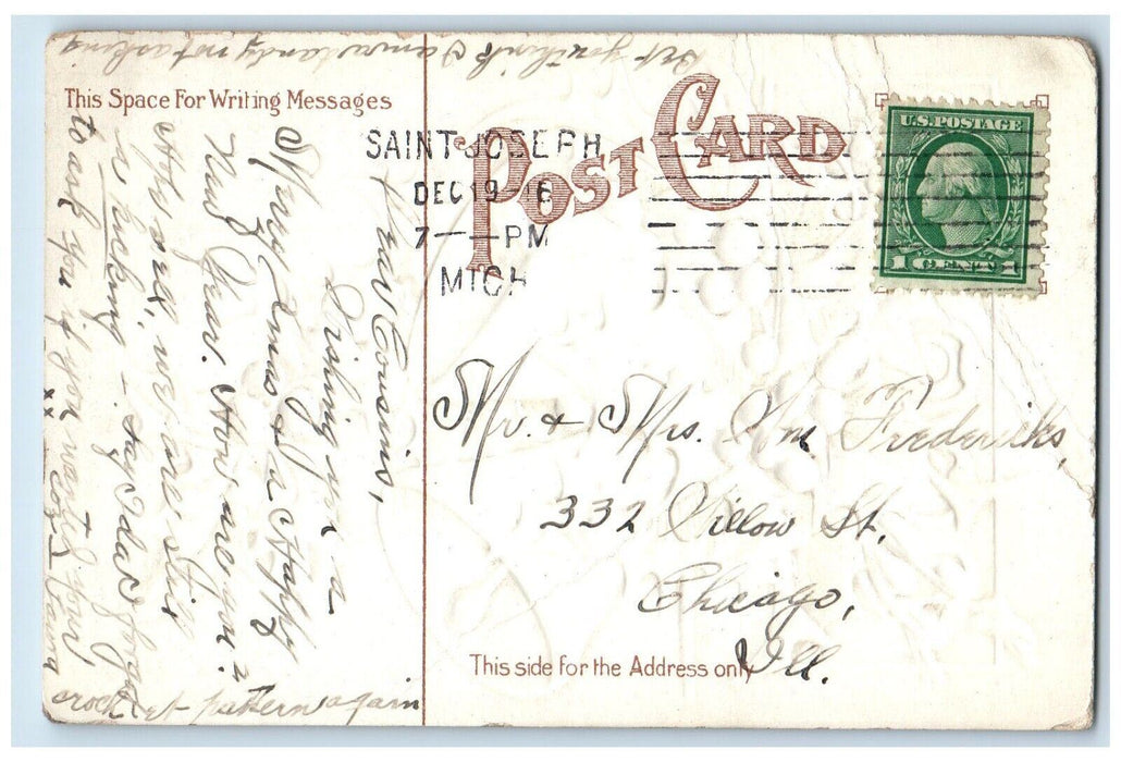 c1910's Christmas Holly Bells Winter Snow Embossed St. Joseph MI Posted Postcard