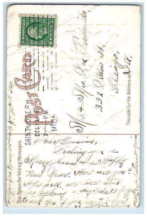 c1910's Christmas Holly Bells Winter Snow Embossed St. Joseph MI Posted Postcard