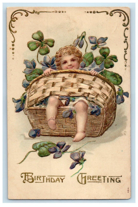 c1910's Birthday Greetings Toddler In Basket Flowers Shamrock Embossed Postcard