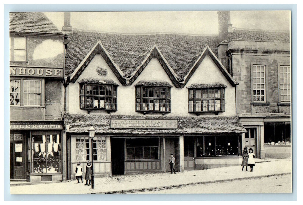 c1940's Lomas' Butcher Shop, Outfitter Oxfordshire Libraries, England Postcard