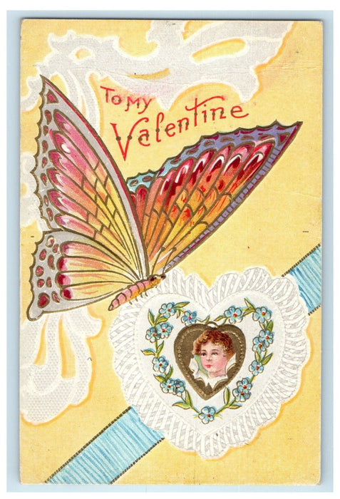 1910 Valentine Butterfly Boy Head In Heart Flowers Embossed Selma CA Postcard