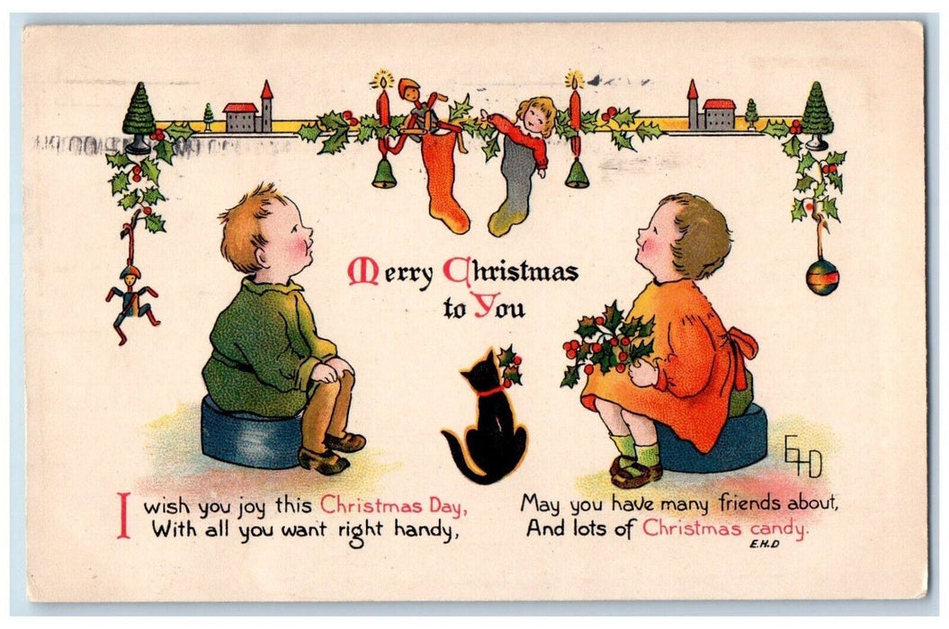 1910 Christmas Boy Girl Stockings Full Of Toys Black Cat Holly Candle Postcard