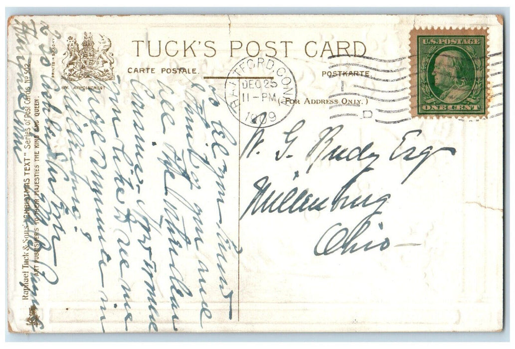 1909 Christmas Joys Holly Berries Logs Fire Embossed Tuck's Antique Postcard