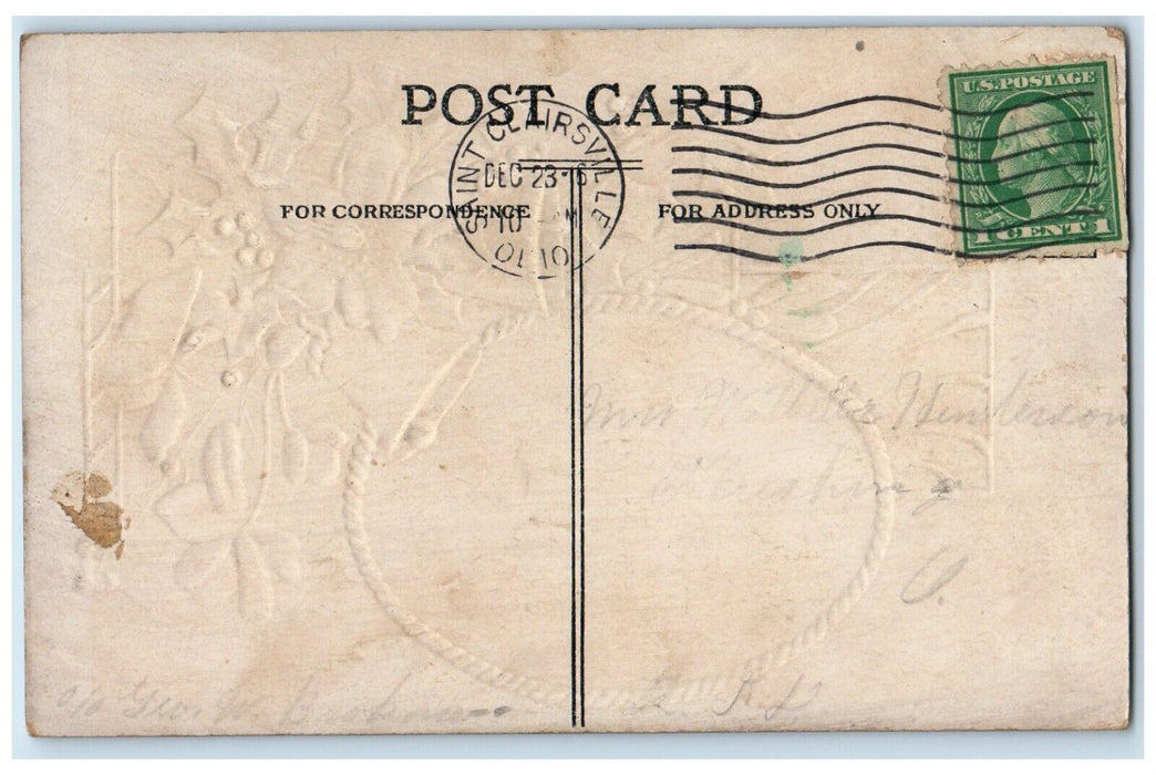 1916 Christmas Holly Bell Flowers Winter Snow House Embossed Antique Postcard