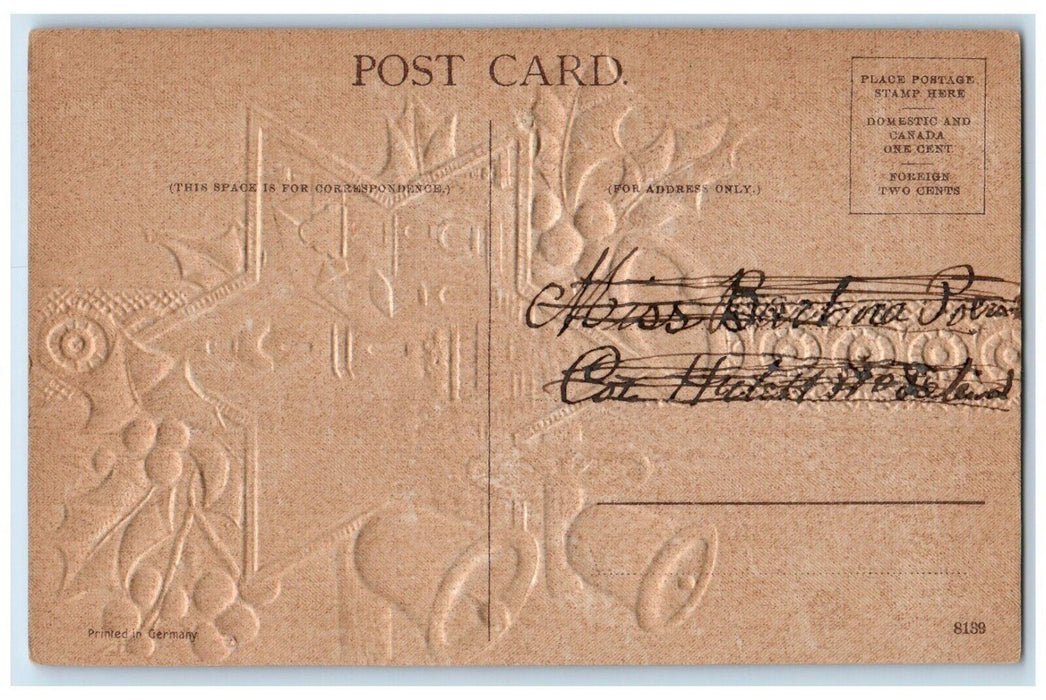 c1910's Christmas Wishes Holly Bells House Church Embossed Antique Postcard