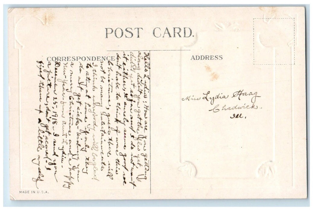 c1910's Christmas Floating Angel Lamb Holly Berries Embossed Antique Postcard