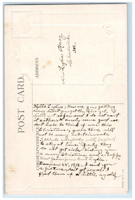 c1910's Christmas Floating Angel Lamb Holly Berries Embossed Antique Postcard