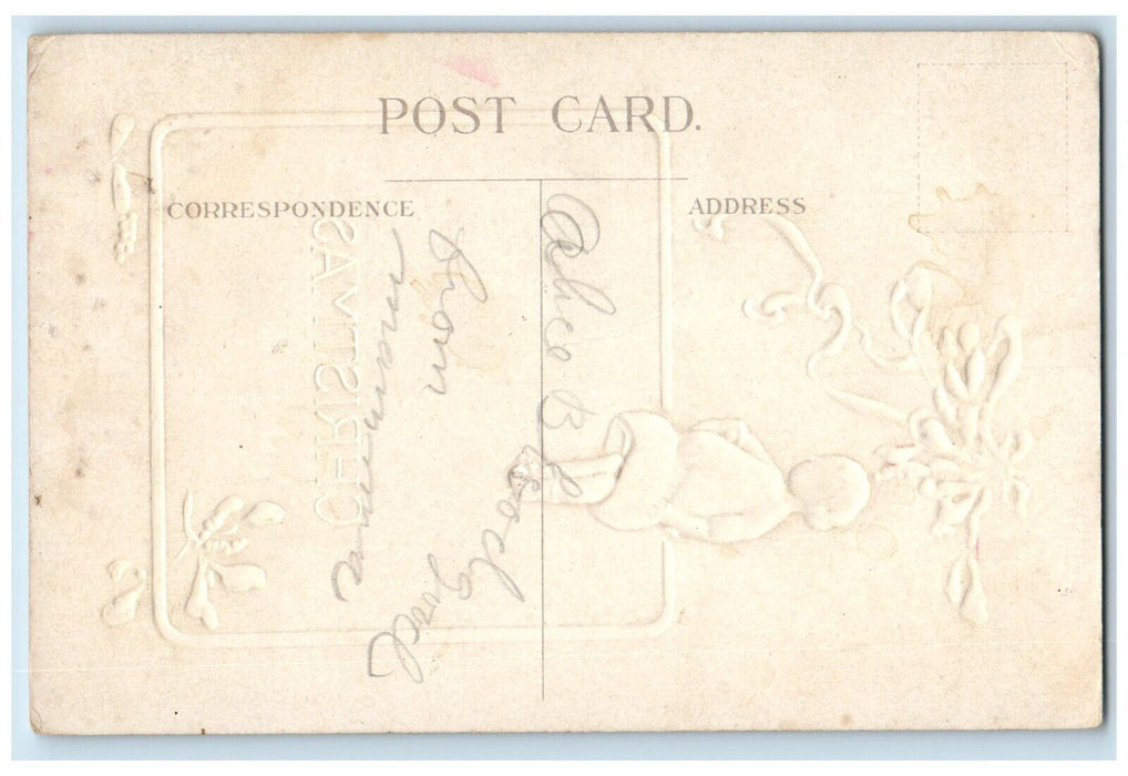 c1910's Christmas Little Girl Doll Red Ribbon Embossed Posted Antique Postcard