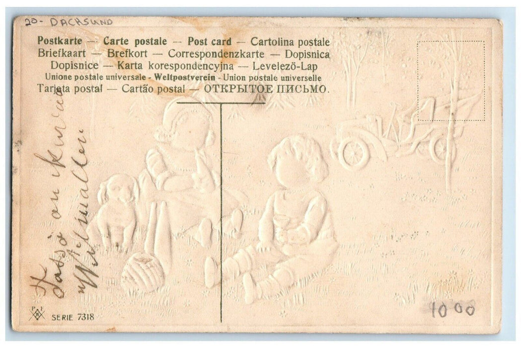 c1910's Dachshund Dog Little Girls Car Pine Trees Embossed Antique Postcard