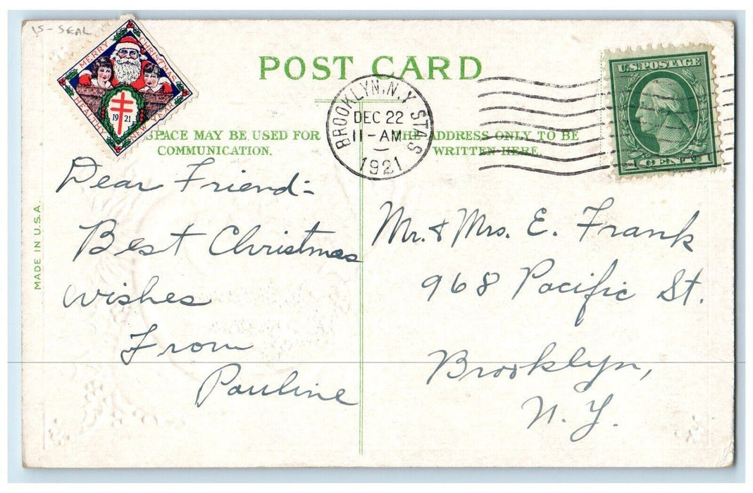1921 Christmas Greetings Santa Reindeer Sleigh Bell Holly Flowers Seal Postcard