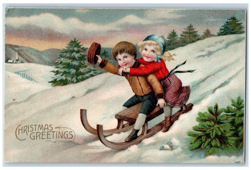 c1910's Christmas Greetings Girl Boy Sledding Winter Snow Pine Trees Postcard