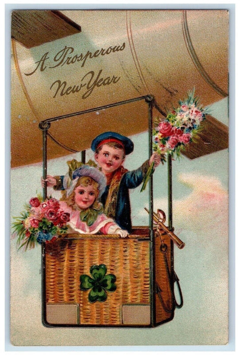 1909 New Year Boy Girl Airship Dirigible Shamrock Flowers Embossed Postcard