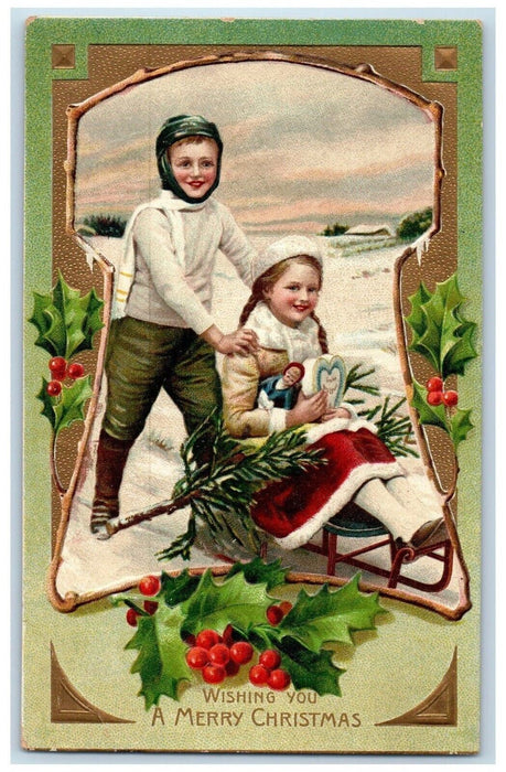 1910 Christmas Boy Girl Doll Sled Holly Berries Winter Snow Embossed Postcard