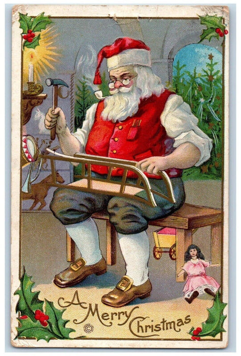 c1910's Christmas Santa Claus Hammer Fixing Sled Holly Candles Embossed Postcard