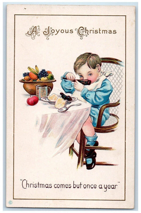 c1910's Christmas Boy Eating Fruits Embossed Posted Antique Postcard