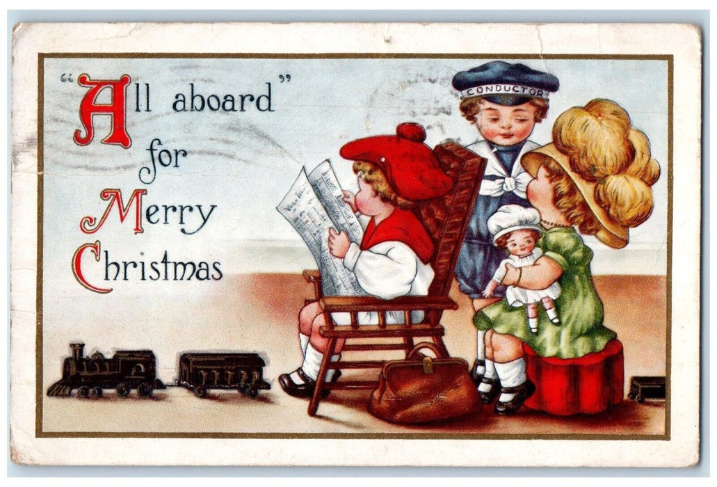 1915 Christmas Train Passenger All Aboard Muscatine Iowa IA Embossed Postcard