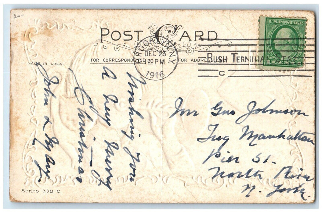 1916 Christmas Little Boy Trumpet Black Cat Holly Leaf Embossed Antique Postcard