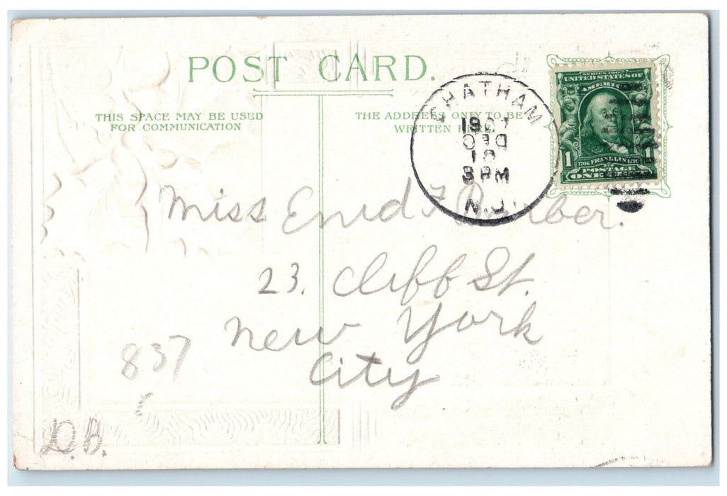 c1910's Christmas Angel Cherubs Head Pansies Flowers Holly Berries Postcard