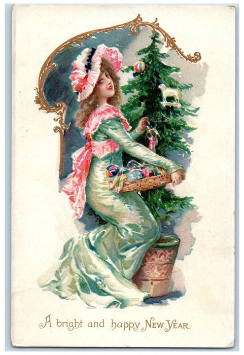 New Year Victorian Girl Decorating Christmas Tree Embossed Tuck's Postcard