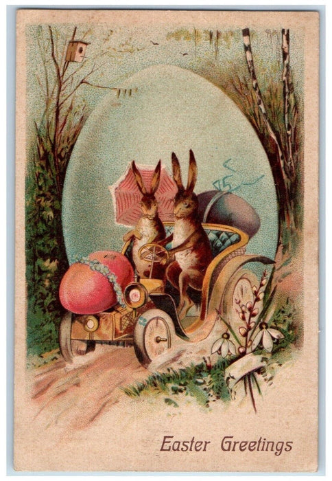 1909 Easter Greetings Rabbit Driving Car Egg Pansies Tiffin Ohio OH Postcard