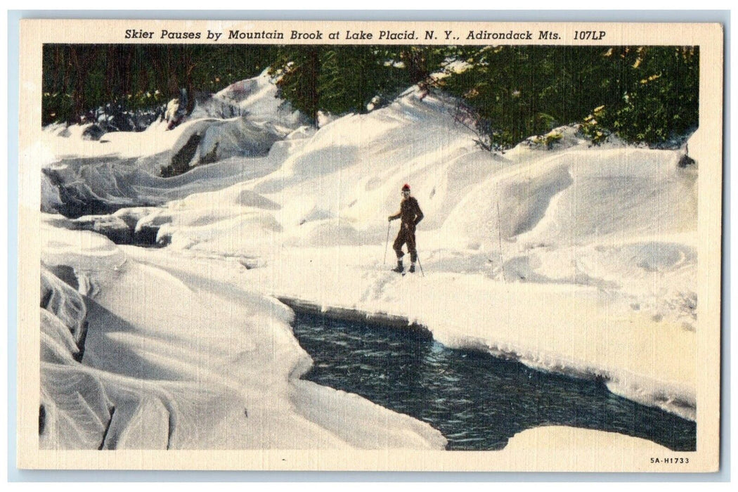 c1940's Skier Pauses By Mountain Brook Lake Placid Adirondack Mts. NY Postcard